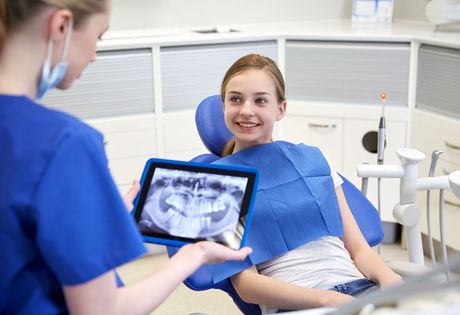 Teeth Check Up — Checking X-ray of Woman's Mouth in Havertown, PA