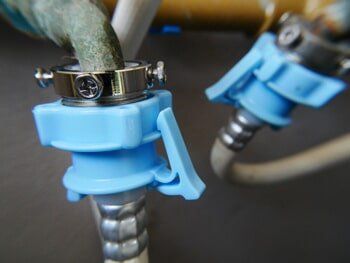 Hose Connected To The Faucet — Agricultural Supplies in Hanford, CA