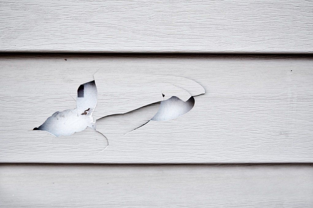 Cracked Siding ─ Mercer, PA ─ Gerlach’s Seamless Gutters & Home Improvements