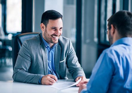 Agent Talking To A Client — Clifton, NJ — Evergreen Commercial Real Estate Brokers Inc Agent Talking To A Client — Clifton, NJ — Evergreen Commercial Real Estate Brokers Inc