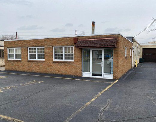 Warehouse With Glass Doors — Clifton, NJ — Evergreen Commercial Real Estate Brokers Inc