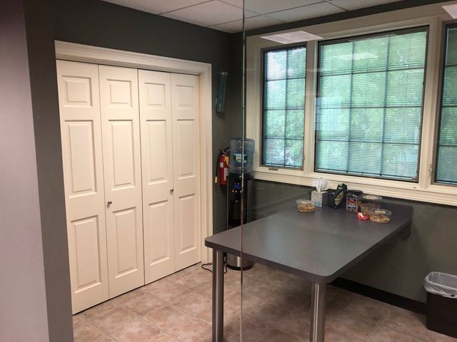 Office Table & Water Dispenser — Clifton, NJ — Evergreen Commercial Real Estate Brokers Inc