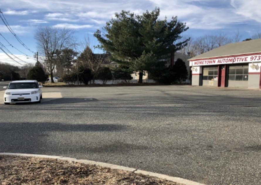 Huge Trees & Ampler Parking Lot — Clifton, NJ — Evergreen Commercial Real Estate Brokers Inc