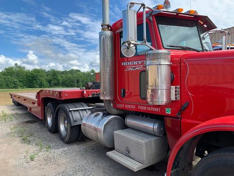 Towing Truck — Waynesburg, OH — Rocky’s Auto & Truck Parts Towing Truck — Waynesburg, OH — Rocky’s Auto & Truck Parts