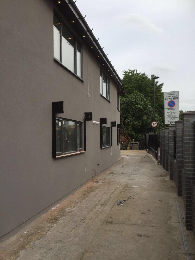 A building with a no parking sign in front of it