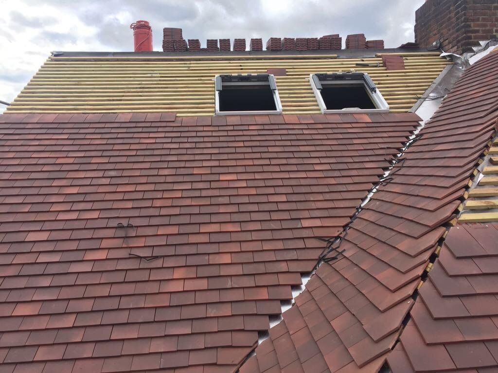 A roof with a few windows on it