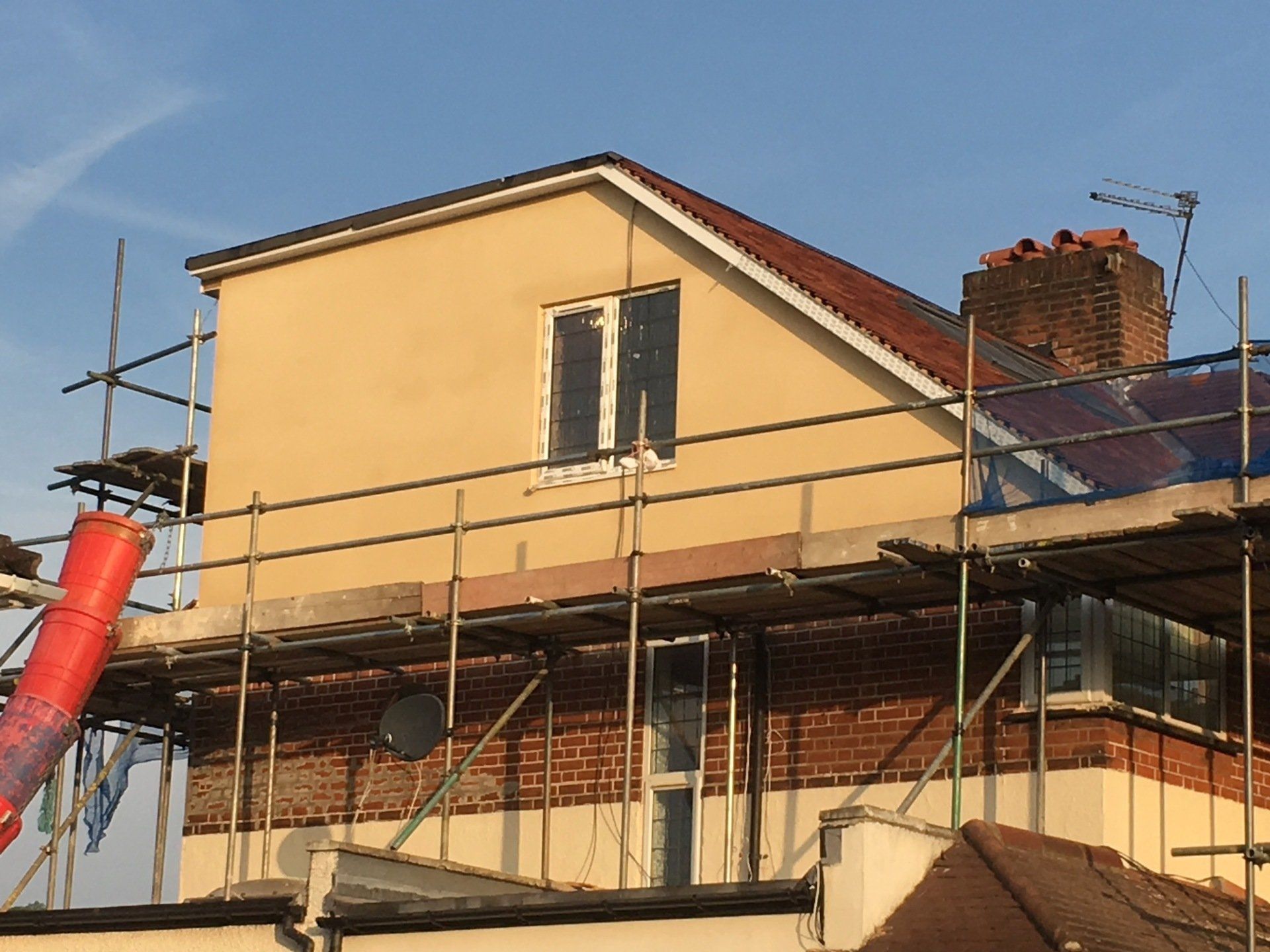 A building under construction with scaffolding around it