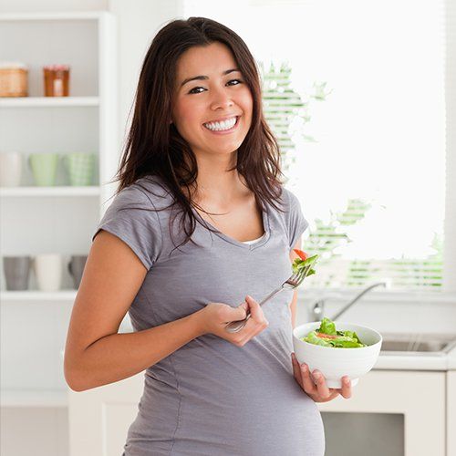 Pregnancy Help — Pregnant Woman Eating Healthy Food in Fresno, CA Pregnancy Help — Pregnant Woman Eating Healthy Food in Fresno, CA