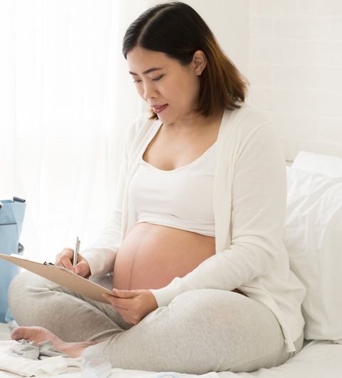 Prenatal Care — Pregnant Woman In The Bed in Fresno, CA Prenatal Care — Pregnant Woman In The Bed in Fresno, CA