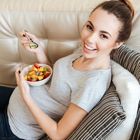 Prenatal Care — Pregnant Woman In The Sofa in Fresno, CA