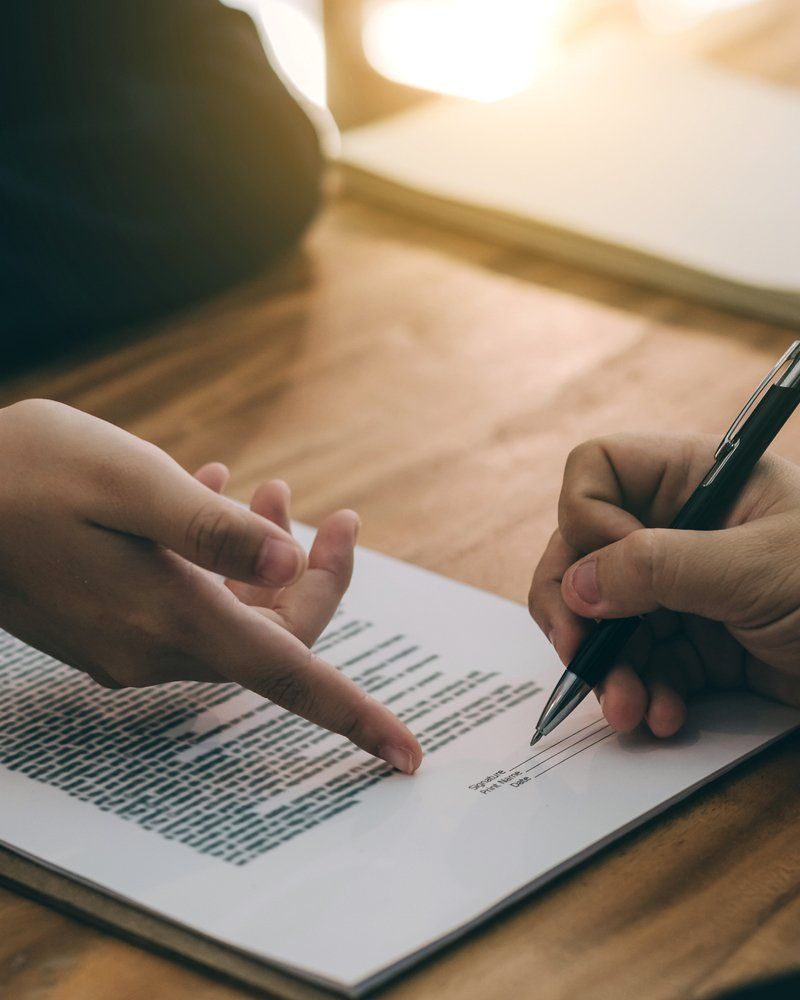 Signing Business Contract — Cumberland, MD — Buckel Levasseur Phillai & Beeman LLC