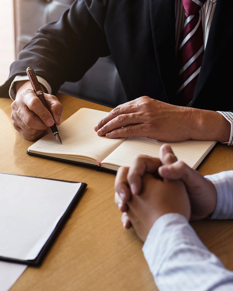 Attorney With Client — Cumberland, MD — Buckel Levasseur Phillai & Beeman LLC