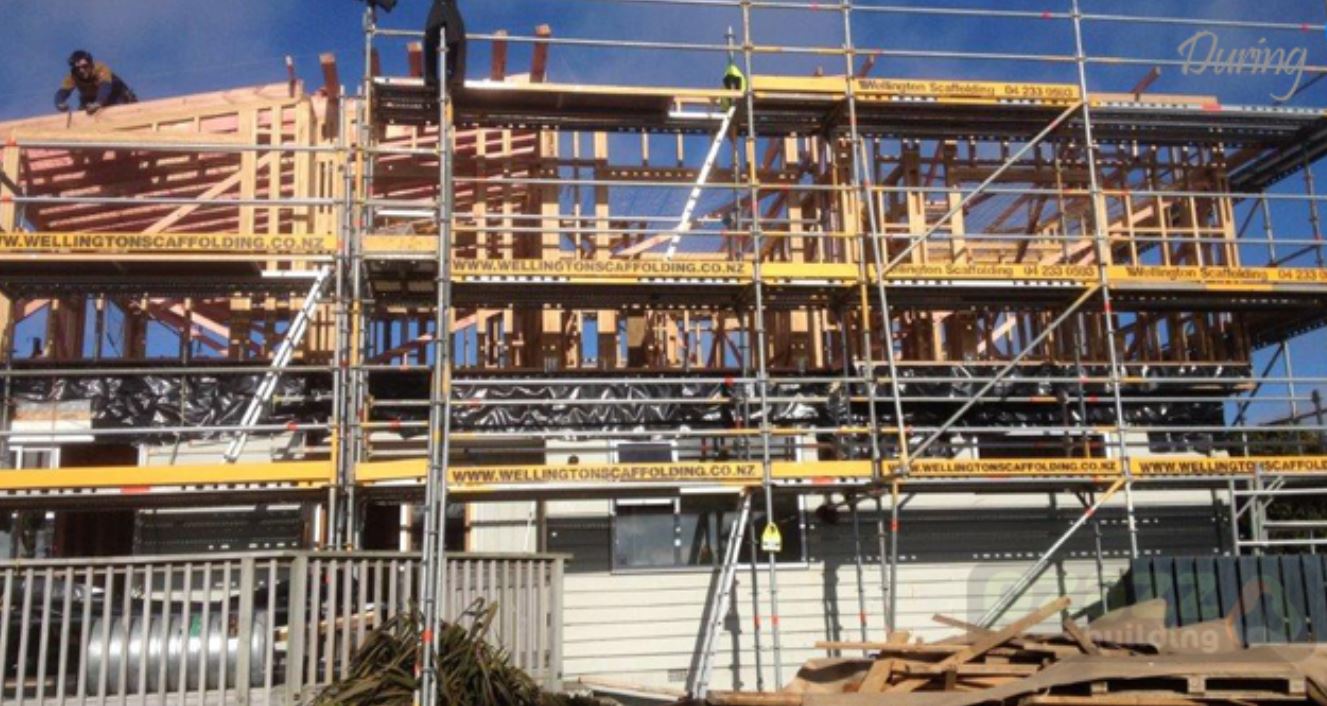 A large building is being built with scaffolding around it.