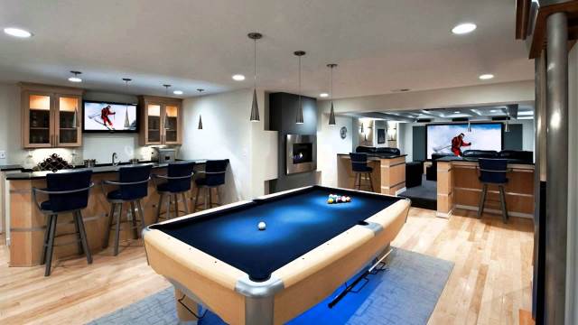This basement has a bar, games room and home theatre Bar and games room in basement