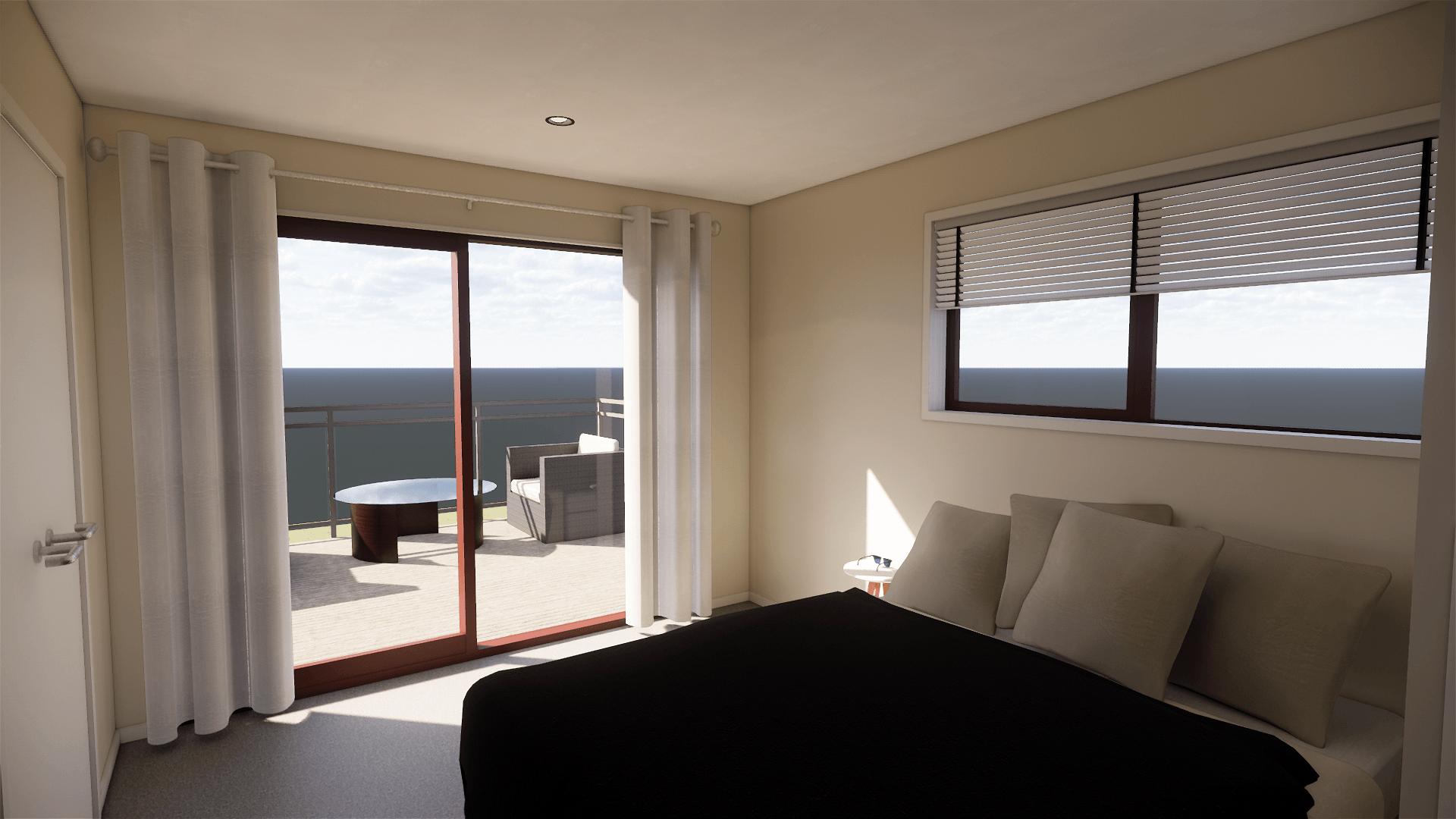 A bedroom with a bed and a balcony overlooking the ocean.