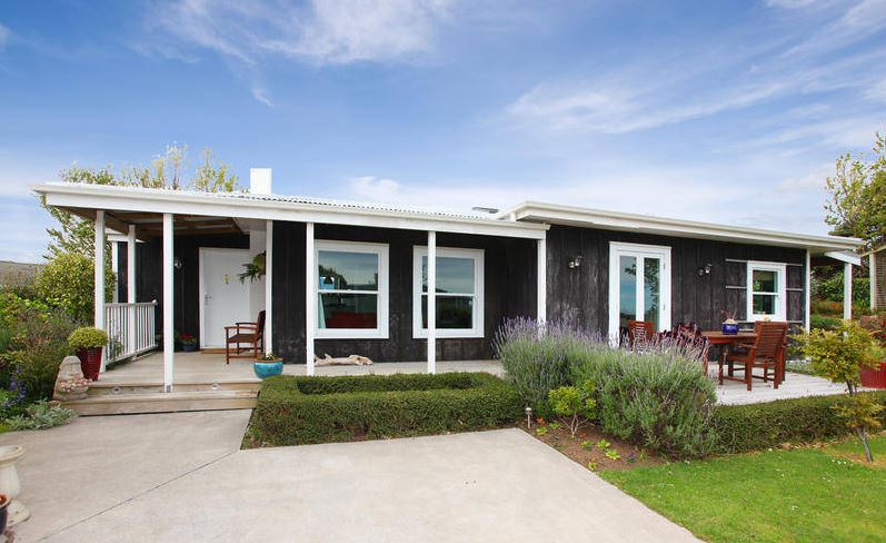 how to choose between brick and timber cladding