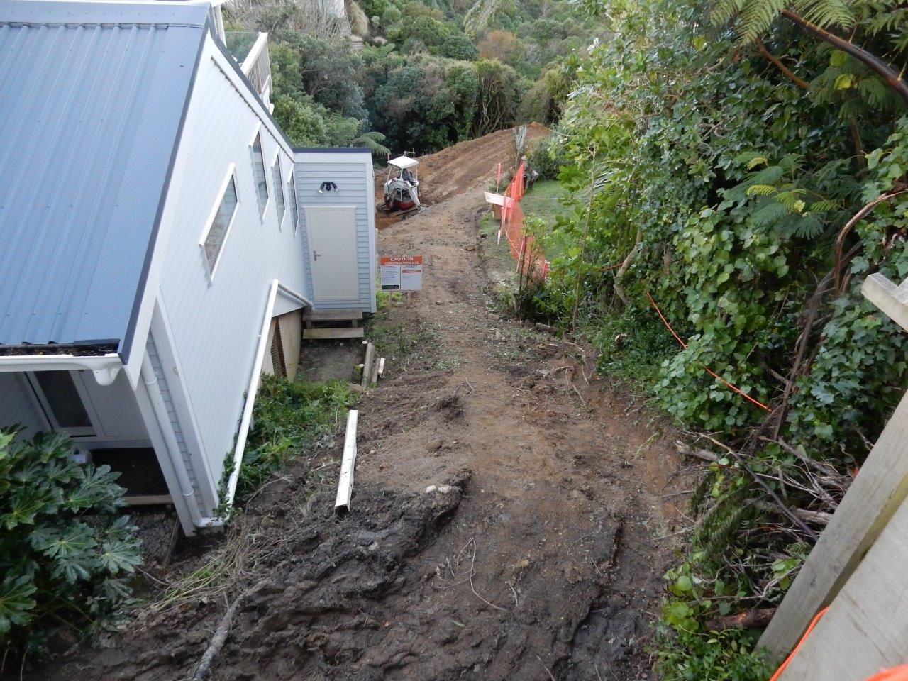This digger had to be craned on to the building site Earthworks on Wellington new home site