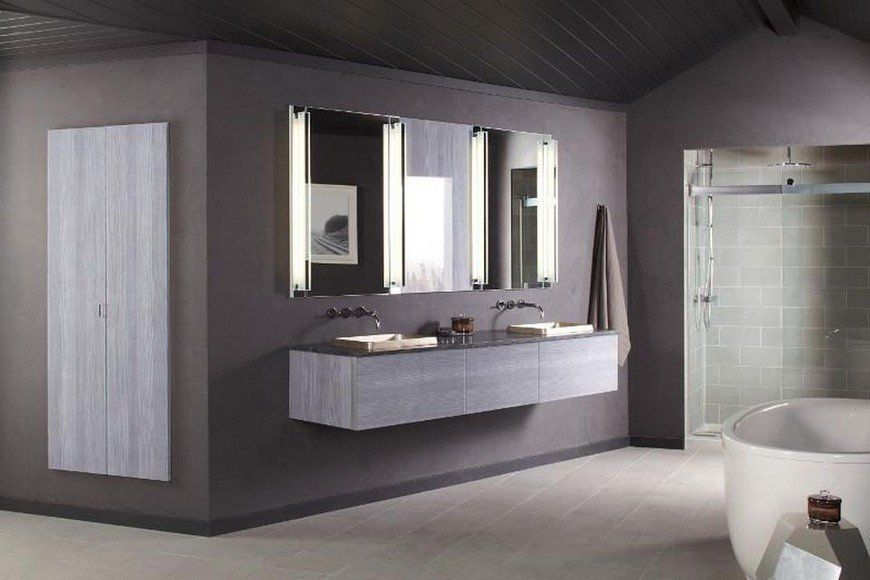 A bathroom with two sinks and a bathtub