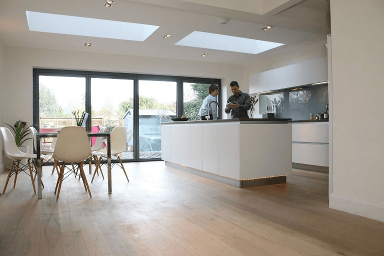 This house extension pushed out the kitchen and dining areas Extended kitchen and dining area