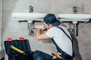 Plumber Service — Plumber Fixing Toilet Sink Pipes in Hockessin, DE Plumber Service — Plumber Fixing Toilet Sink Pipes in Hockessin, DE