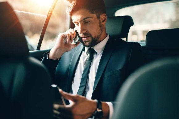 man travelling in a taxi