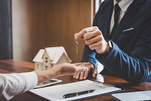 Giving the Key to the Client — Broward/Miami-Dade, FL — Attorney Robert Worman