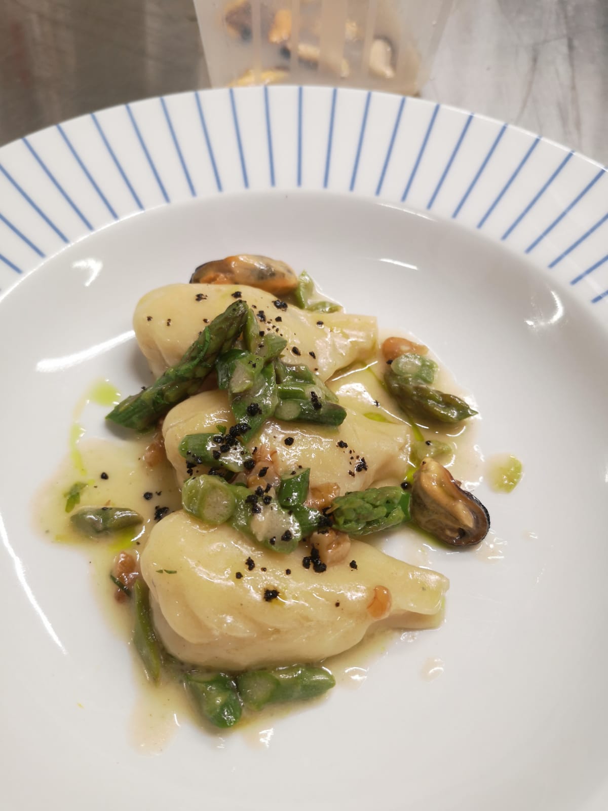 culurgiones with mussels and asparagus