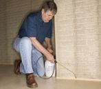 Spraying rodent control liquid at a Perth property
