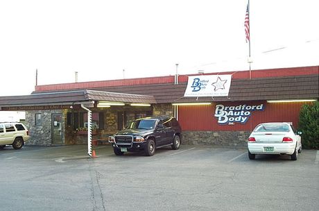 Auto Body Mechanic — Mechanic Fixing Auto Body in Littleton, CO