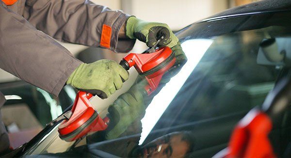 Car Wreck FAQ — Man Replacing Car Mirror in Littleton, CO Car Wreck FAQ — Man Replacing Car Mirror in Littleton, CO