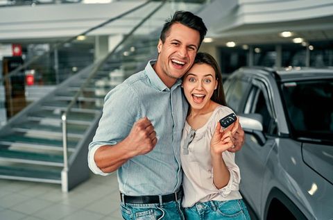 Couple Having New Auto — Palm Coast, FL — Tim Huber Insurance and Financial Services Couple Having New Auto — Palm Coast, FL — Tim Huber Insurance and Financial Services