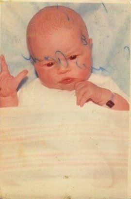 Damaged photo of an infant — Newark, DE — Foto Doctor