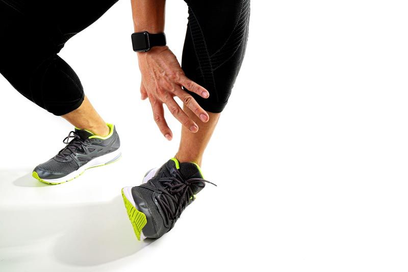 person spraining ankle