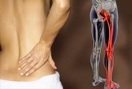 person holding their painful back
