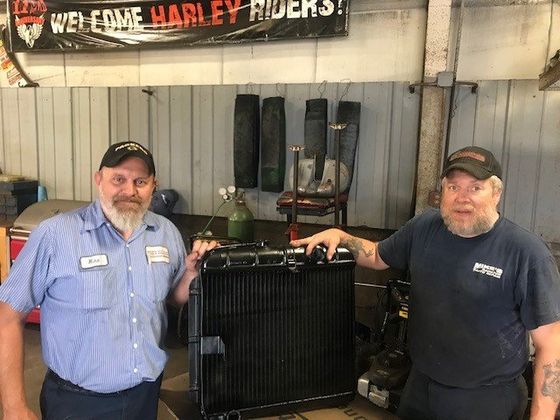 Radiator Service — Opening a Cover of Radiator in Waukesha, WI Radiator Service — Opening a Cover of Radiator in Waukesha, WI