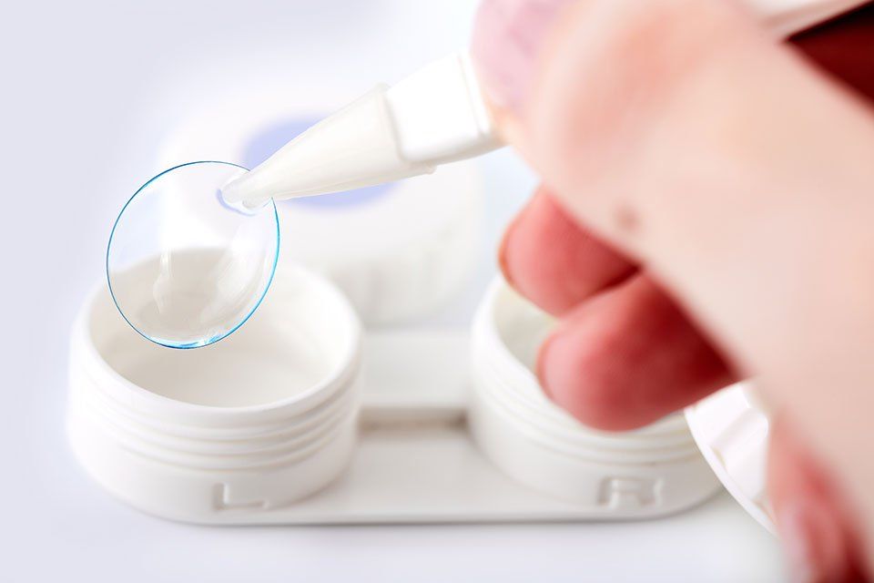 picking up contact lenses