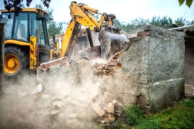 Demolishing Concrete Brick Wall — Greenwood, SC — Kinard's LLC Demolishing Concrete Brick Wall — Greenwood, SC — Kinard's LLC