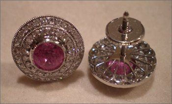 Natural pink Sapphire earrings with diamonds in platinum setting