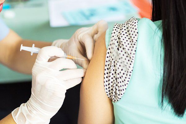 Lady Having A Vaccination — Memphis, TN — Vaccine Injury Lawyers Lady Having A Vaccination — Memphis, TN — Vaccine Injury Lawyers