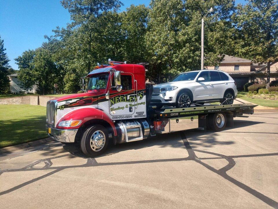 Towing a Black Auto — Texarkana, TX — Neeley's Service Center Towing a Black Auto — Texarkana, TX — Neeley's Service Center