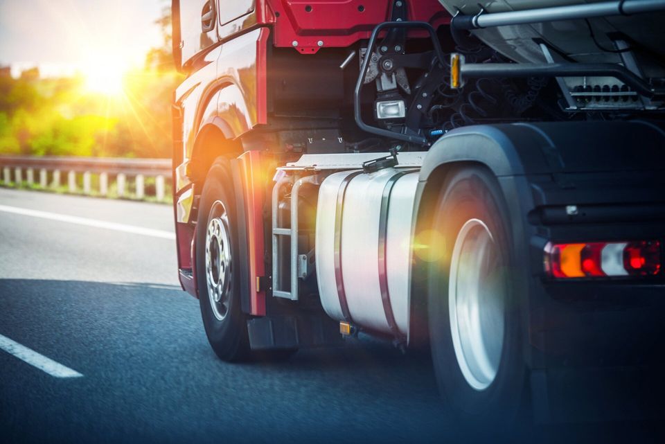 Red Semi Truck — Texarkana, TX — Neeley's Service Center Red Semi Truck — Texarkana, TX — Neeley's Service Center