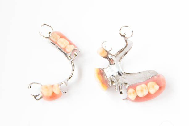 dental crown on a fingertip