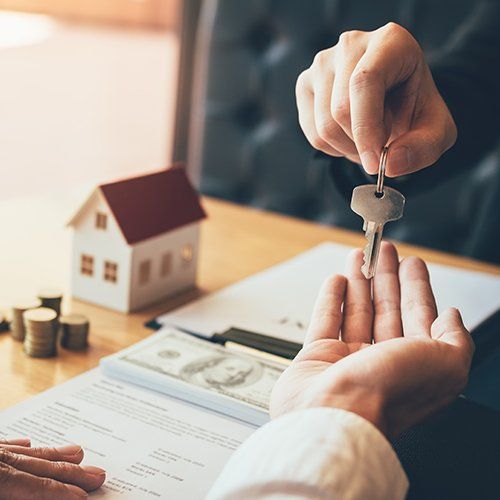 Home Agents Are Handing out Keys to New Home Buyers — Cape Coral, FL — Ordonez Realty Home Agents Are Handing out Keys to New Home Buyers — Cape Coral, FL — Ordonez Realty