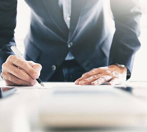 Man Writing - Commercial Insurance in Siley City, NC Man Writing - Commercial Insurance in Siley City, NC