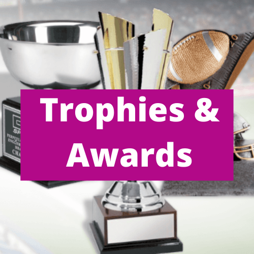 A purple sign that says trophies and awards on it