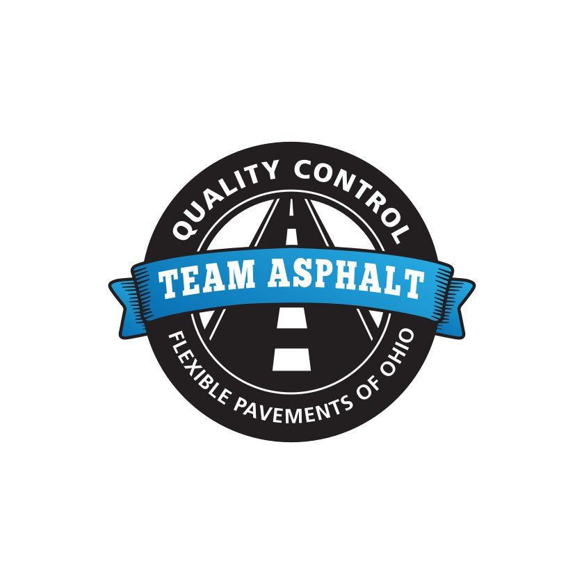 Team Asphalt logo: black circle, blue banner