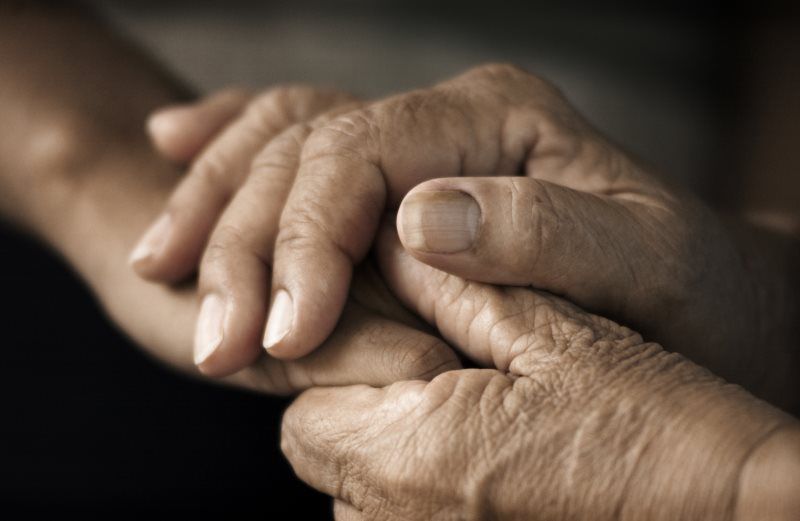 Hands holding each other
