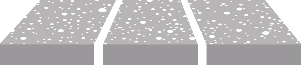 Gray road seen from above with white dashed lane markings and a striped divider in the center