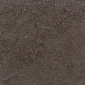 Close-up of a dark brown, textured stone or concrete surface with faint cracks.