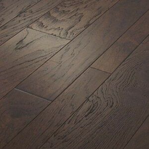 Close-up of dark brown wood flooring with visible grain and plank seams